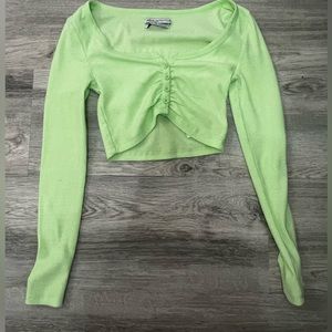 Lime green button down cropped long sleeve in XS.